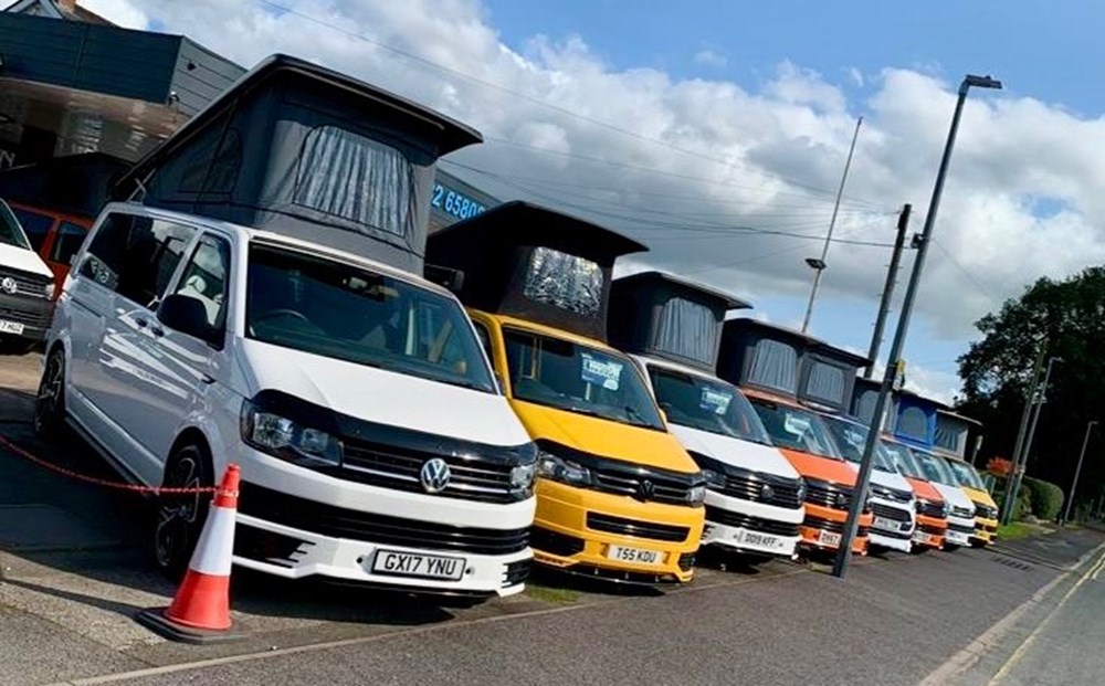 Camper vans lined up on the Strongford Garage forecourt